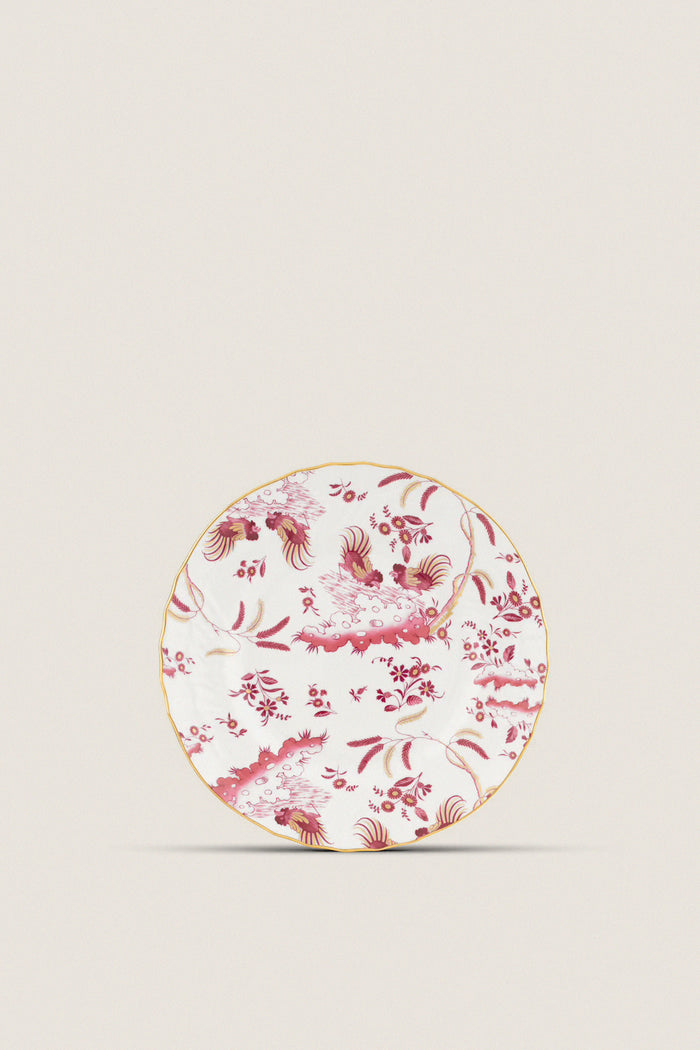 Oro Di Doccia Magenta Dinner Plate featuring classic floral and rooster motifs with gold trim, handcrafted in Italy for an effortless, high-end tablescape addition.