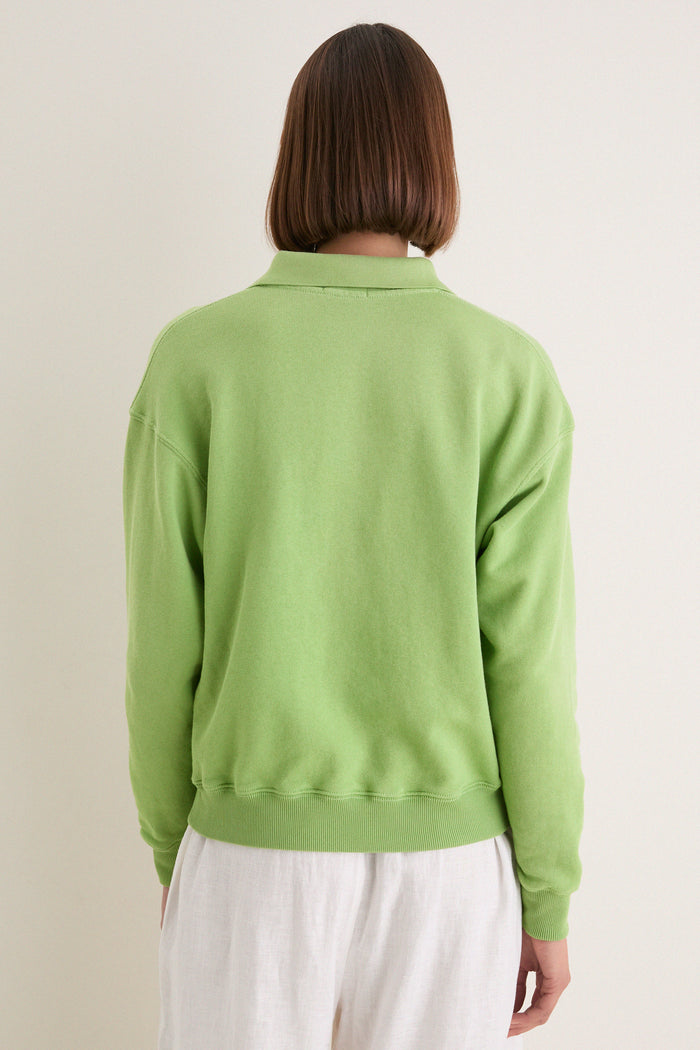 Parakeet Green Island Fleece Knit Polo: Classic, effortless pullover with a relaxed fit, ribbed cuffs, and iconic embroidered Pony, perfect for high-end, fun style.