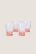 Peony Pink Spiral Tumbler (Set of 4), featuring classic rib-patterned, swirled texture with a flared silhouette, offers an effortless, high-end touch to any fun tablescape.