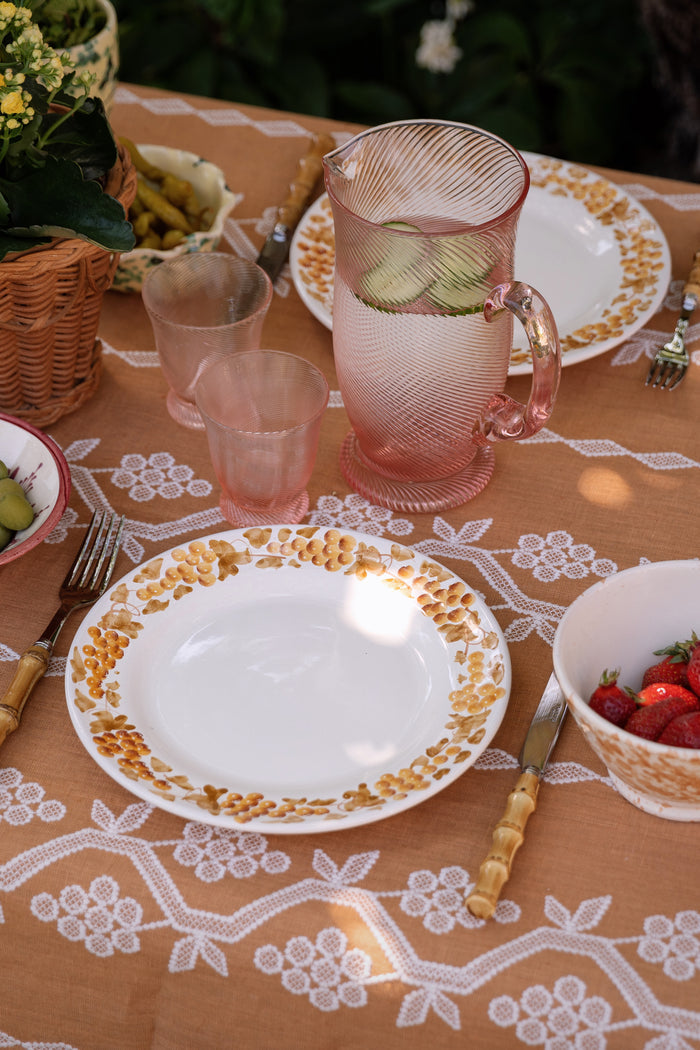 Peony Pink Spiral Tumbler set adds an effortless, fun, high-end touch to a classic garden party table with water and cucumber slices.