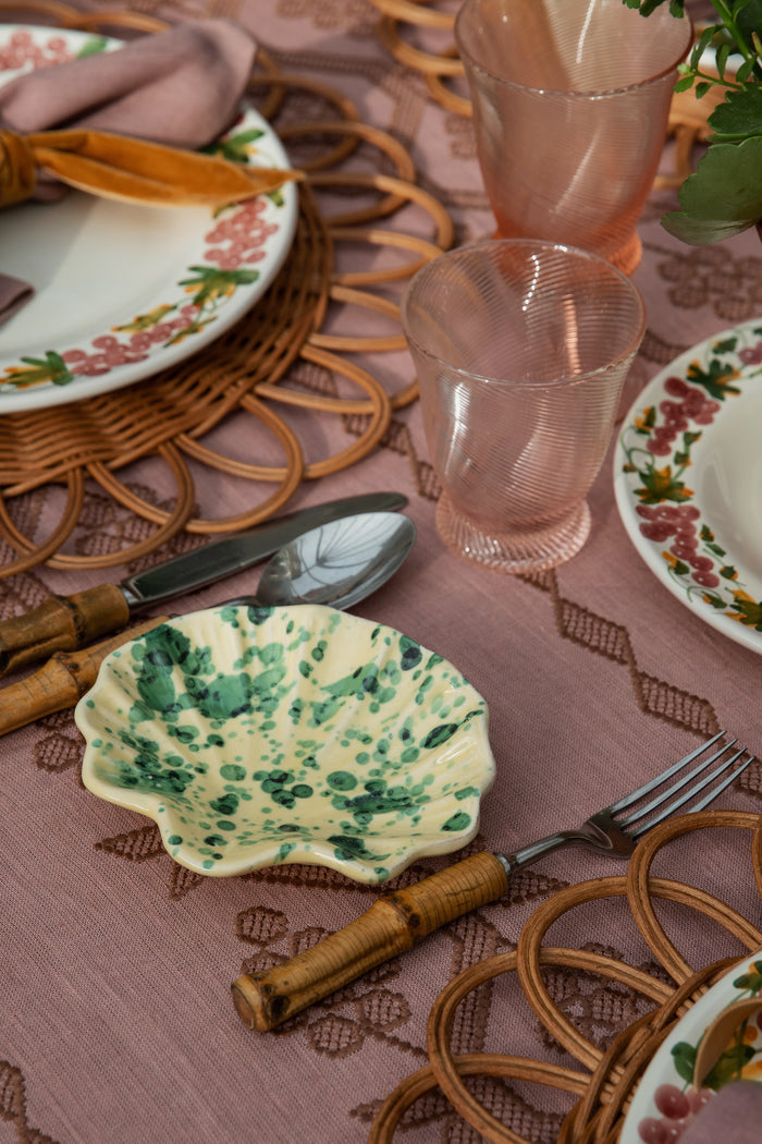 Peony Pink Spiral Tumbler, classic and effortless on a rustic table setting, adds a fun, high-end touch with its translucent, ribbed elegance.
