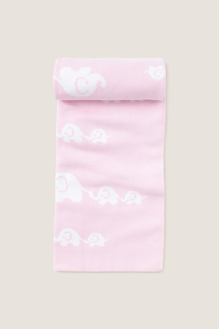 Pink Elephant Knit Blanket: A classic, ultra-soft cotton baby blanket, effortlessly adorned with playful white elephant silhouettes, blending fun design with high-end comfort.