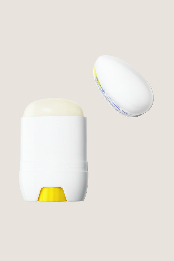 Play Sunscreen Stick SPF 50 1.5oz, classic twist-up design with yellow base, effortless clear application, high-end SPF protection, teardrop shape for fun, precise use.