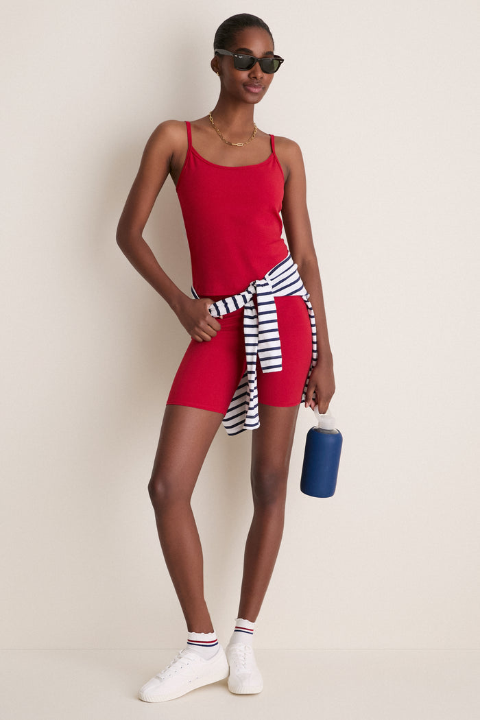 Effortlessly chic Red Compression Spandex Mac Bike Short with a high-rise waistband, showcased in a fun, sporty outfit for a classic, high-end athleisure look.