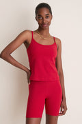 Young woman wears the classic, high-end Red Compression Spandex Sofia Cami, featuring a sleek design with adjustable straps and a built-in shelf bra for effortless style and comfort.