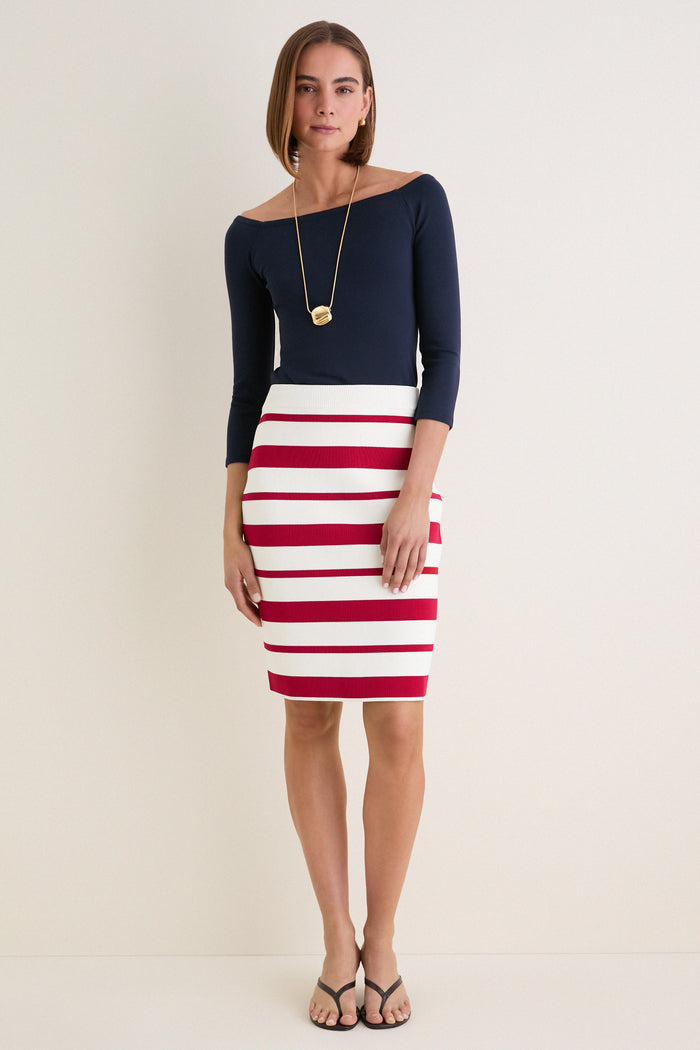 Classic and effortless, the Ruby Knit Stripe Milo Pencil Skirt showcases bold red and white stripes, creating a fun, high-end look perfect for any occasion.