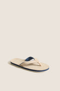 Sand Pier Pebbled Leather Sandal with a classic, minimalist design; features a light beige footbed and stylish Y-shaped strap, perfect for effortless, high-end casual wear.