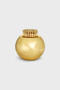 AERIN’s round, shiny gold container, crafted from solid brass as a match striker, holds upright wooden toothpicks—an elegant piece perfect for artisanal home decor.