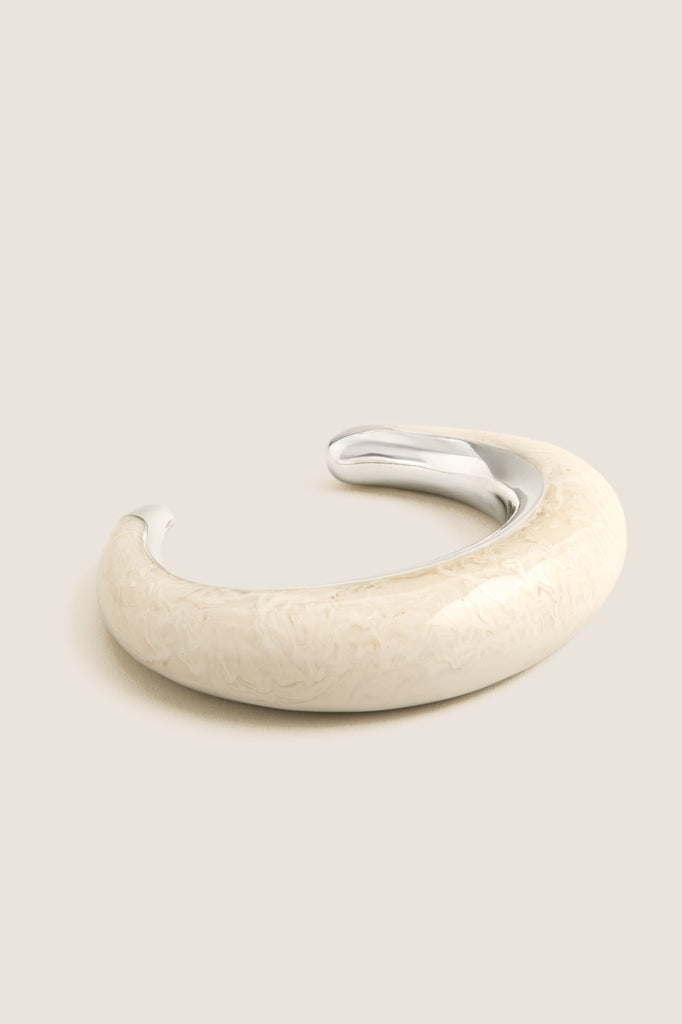 Classic Swirl Chalk Crescent Cuff featuring a smooth marbled finish and polished silver-tone accents, offering an effortless, high-end, and fun accessory to elevate any outfit.