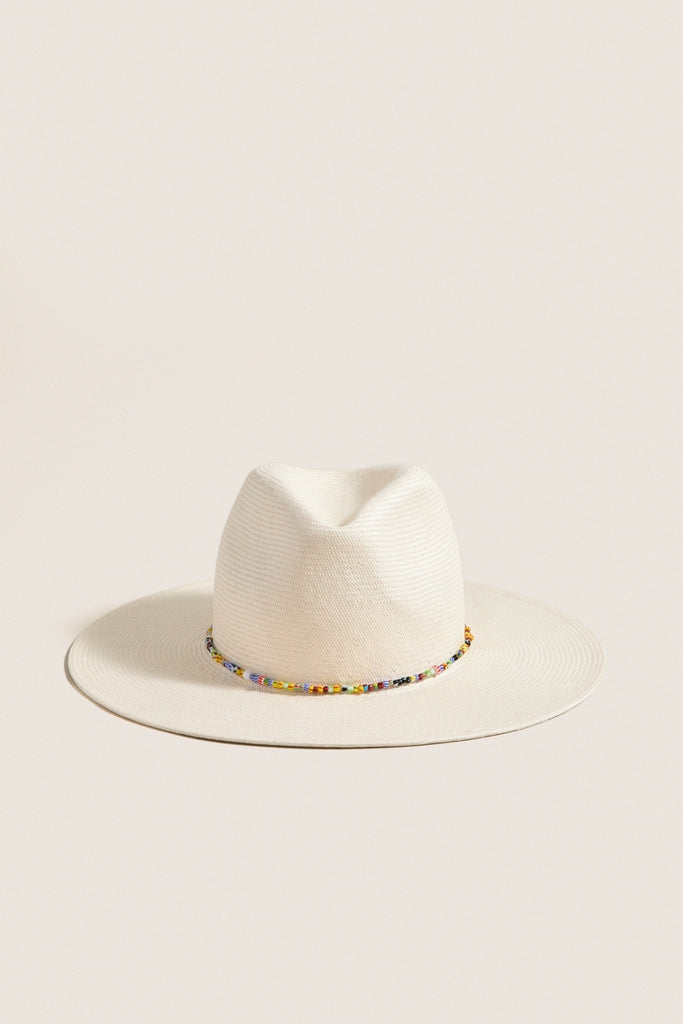 White and Multi Charlotte Traveler Hat, a classic wide-brimmed straw fedora with playful multicolored bead accents, offering effortless sun protection and high-end style.