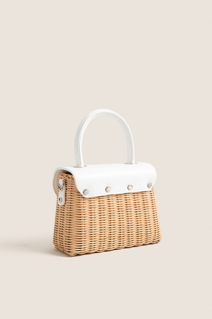 White Elle Wicker Top Handle: A classic, structured wicker handbag with a white vegan leather top flap and handle, offering effortless style for high-end, fun occasions.