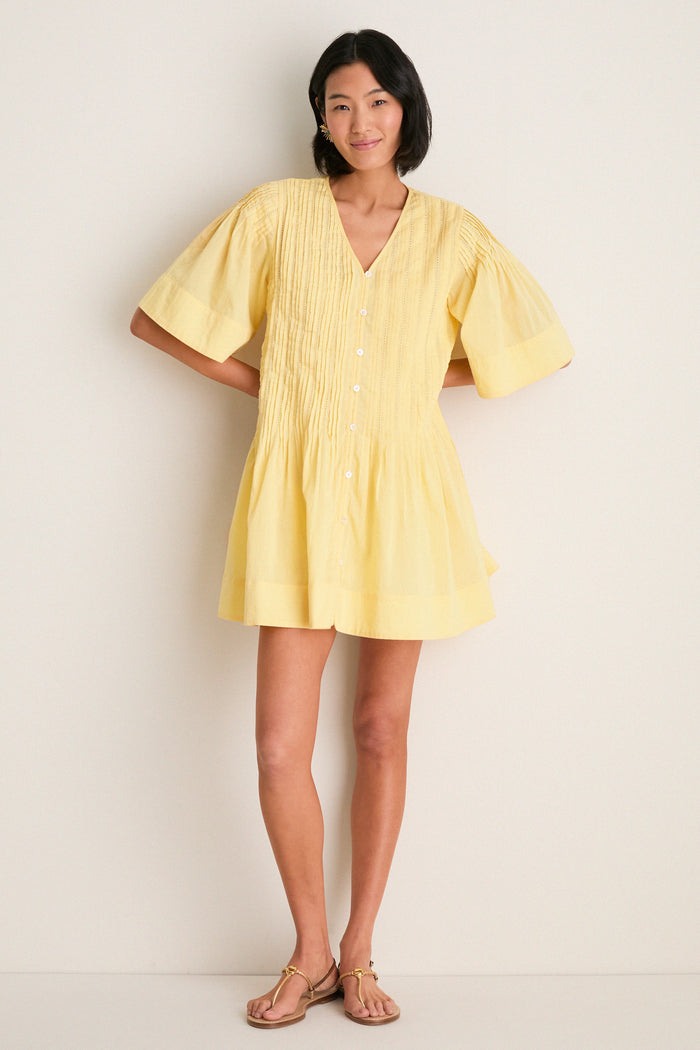 Yellow Alberte Solid Mini Dress: Classic, effortless style with pintuck pleats and button-front detail, perfect for a fun, high-end look.