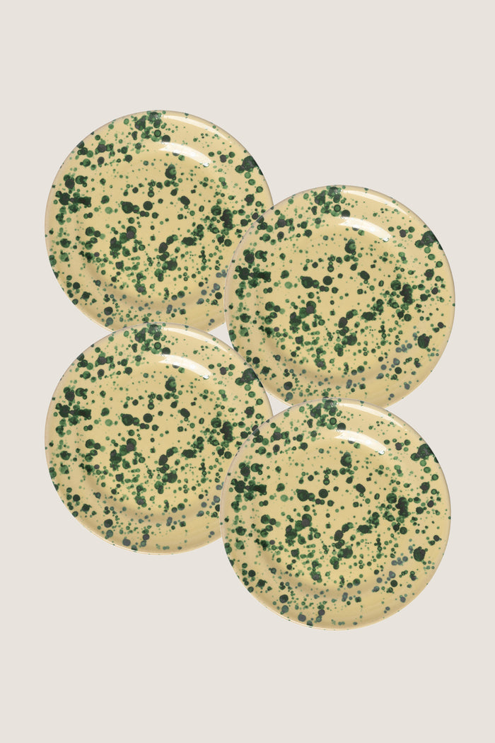 Yellow and Verde Splatter Dinner Plate set of four; ceramic plates with a classic pale yellow base and dark-green splatter, effortlessly blending fun and high-end Italian craftsmanship.